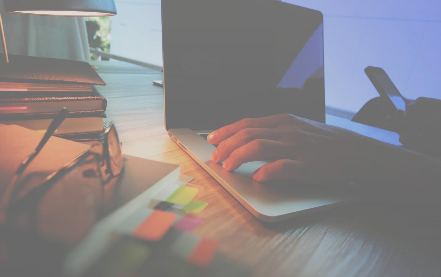 Developer reviewing code architecture and system design documentation